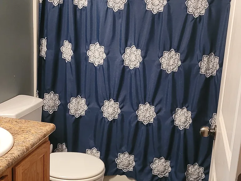 Full bath downstairs off living room.
