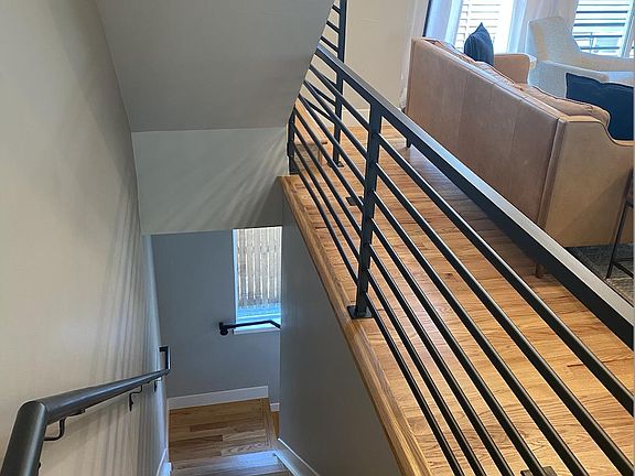 Stairs up to living room and kitchen