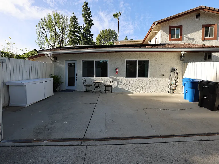 Yard with open gate