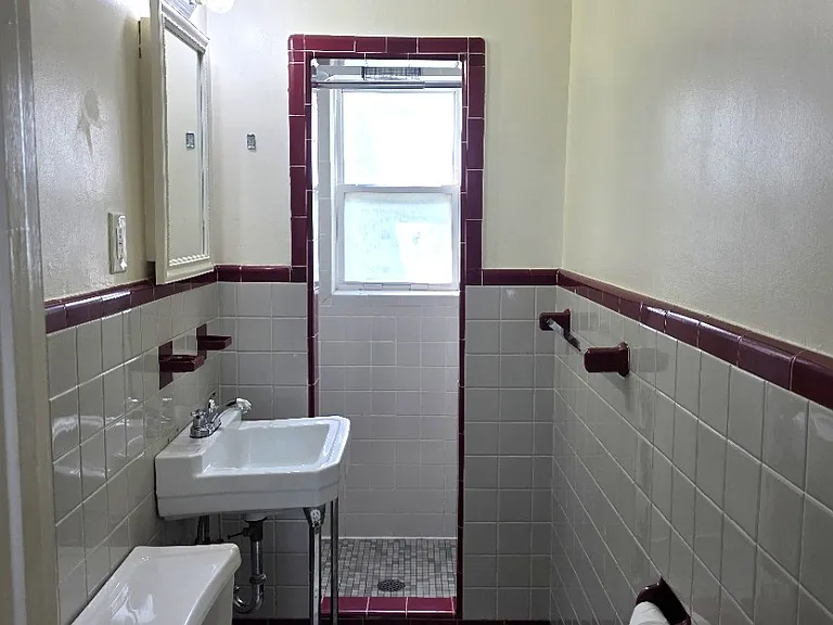 Bathroom with tiled shower