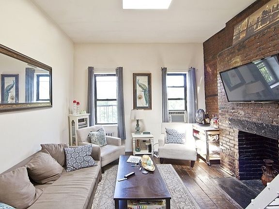 2nd image of 154 E 7th St APT 7