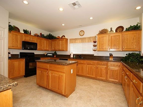 Kitchen with breakfast bar and island