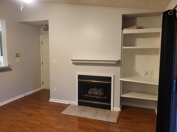 Living room with fireplace and entrance foyer