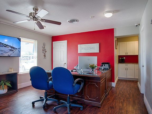 Leasing office interior with seating area and modern decor
