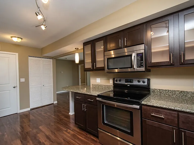 All Day-to-Day Conveniences Included - Dishwasher, In Unit Laundry, Central A/C, Garage Parking, Secure Package Delivery