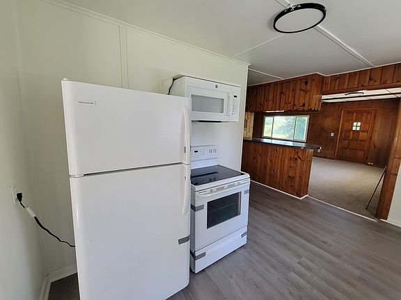 Kitchen with view of living area