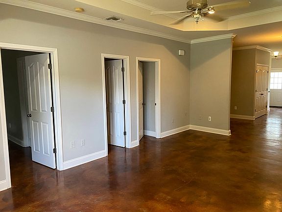 Front of living room looking toward other rooms and kitchen