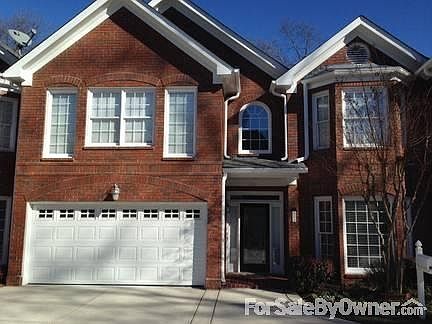 Sturdy two story all-brick townhome
						:
						In quaint Sandy Springs, in the sought-after Glenridge / Mount Vernon area.