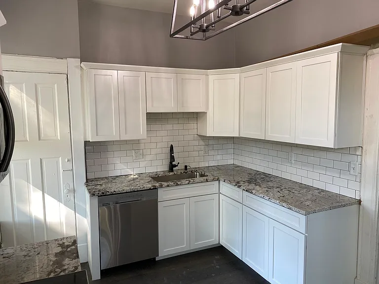 Kitchen on 2nd floor with another back entrance/stairwell!