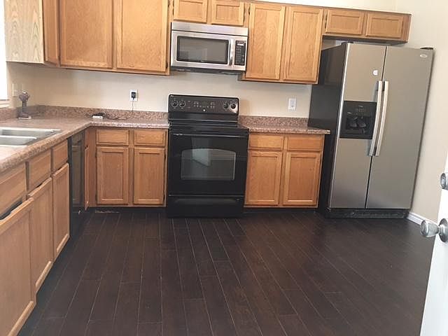 Kitchen, comes with fridge.