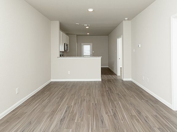 Family Room to Kitchen and Dining Area