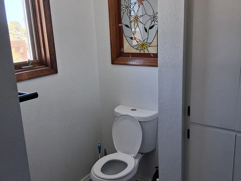 2nd level bathroom, shower and tub