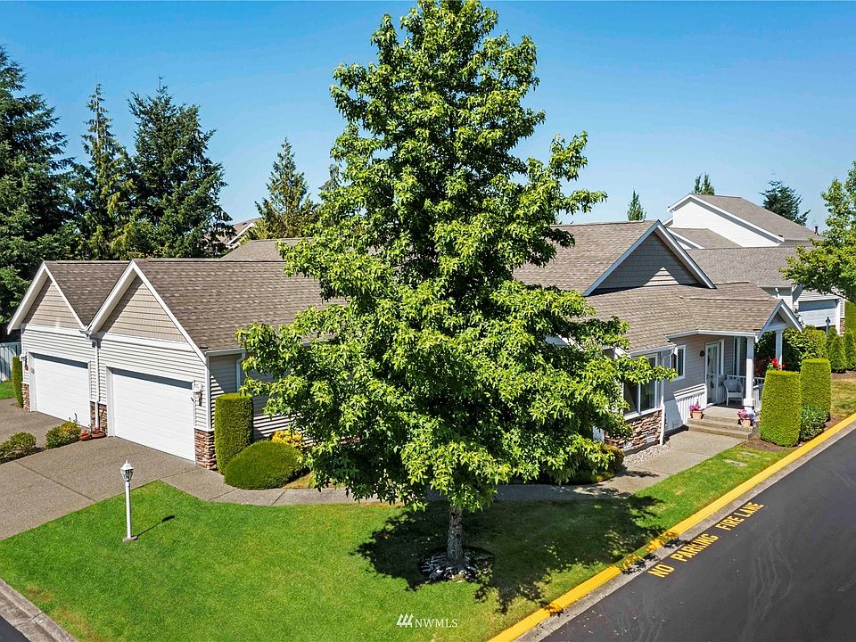 Perfectly situated on a corner lot in the desirable, gated Palisades neighborhood>