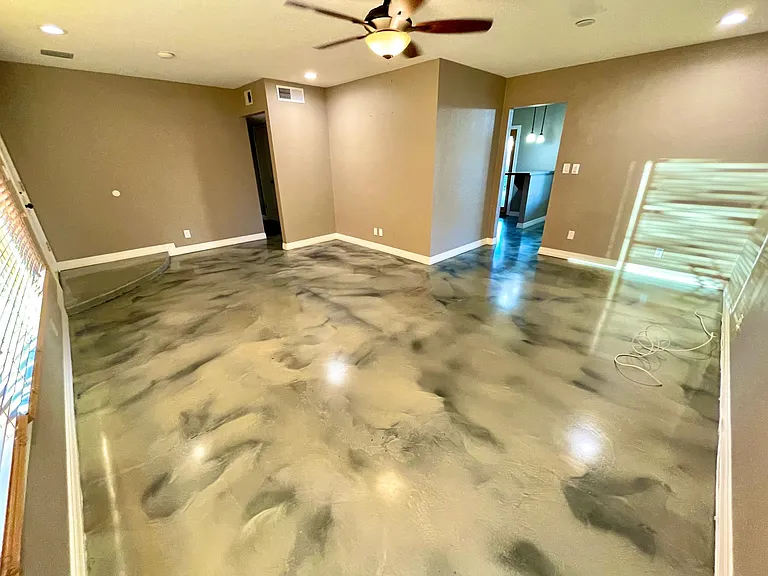 large living room with epoxy stain concrete floors
