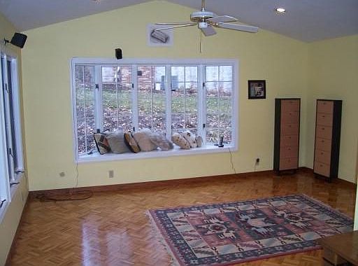 Family room with vaulted ceiling and bay window!