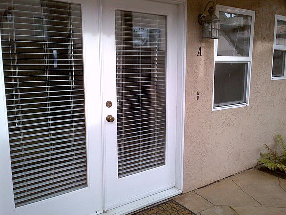 French doors off of patio let in lots of natural light.