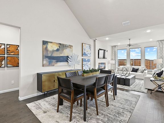 Dining room in the Wimbledon home plan by Trophy Signature Homes - REPRESENTATIVE PHOTO