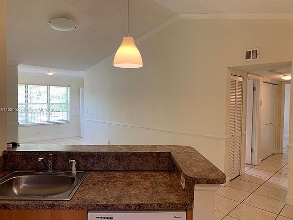 3rd image of 3430 Pinewalk Dr N APT 627