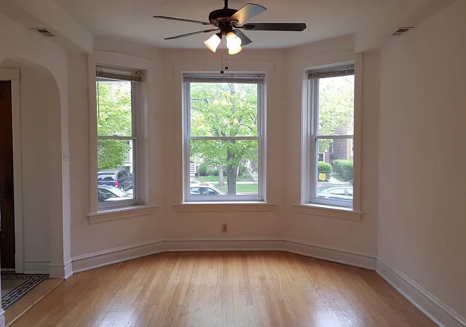 Beautiful Bay Windows to tree-lined street!