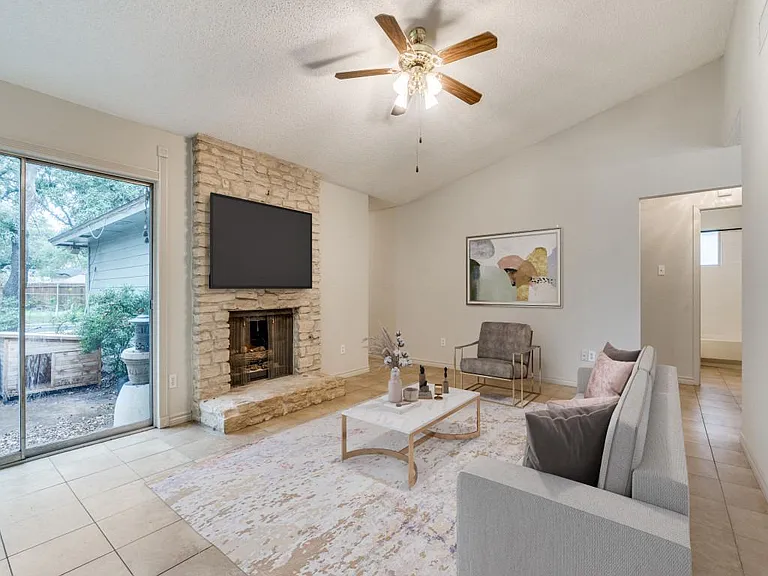 LARGE FAMILY room with vaulted ceiling
fireplace no carpet in the home !