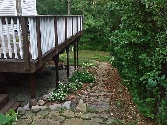 Stone path alongside deck