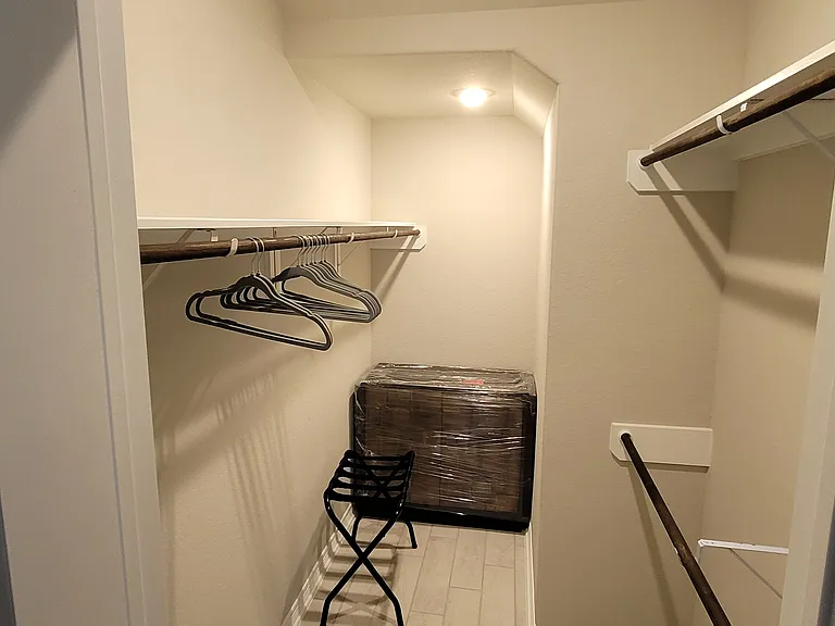 Downstairs bedroom has a large walk-in closet