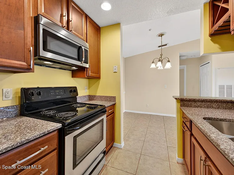 7667 N Wickham Rd #219 — Photo 7