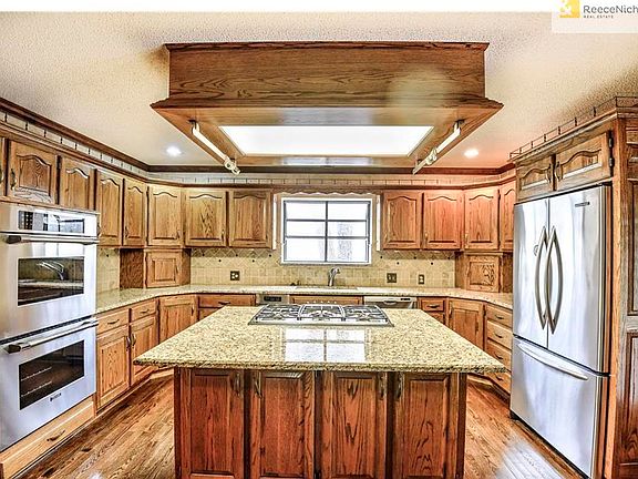 Close up view of the well appointed kitchen which offers stainless steel appliances including double