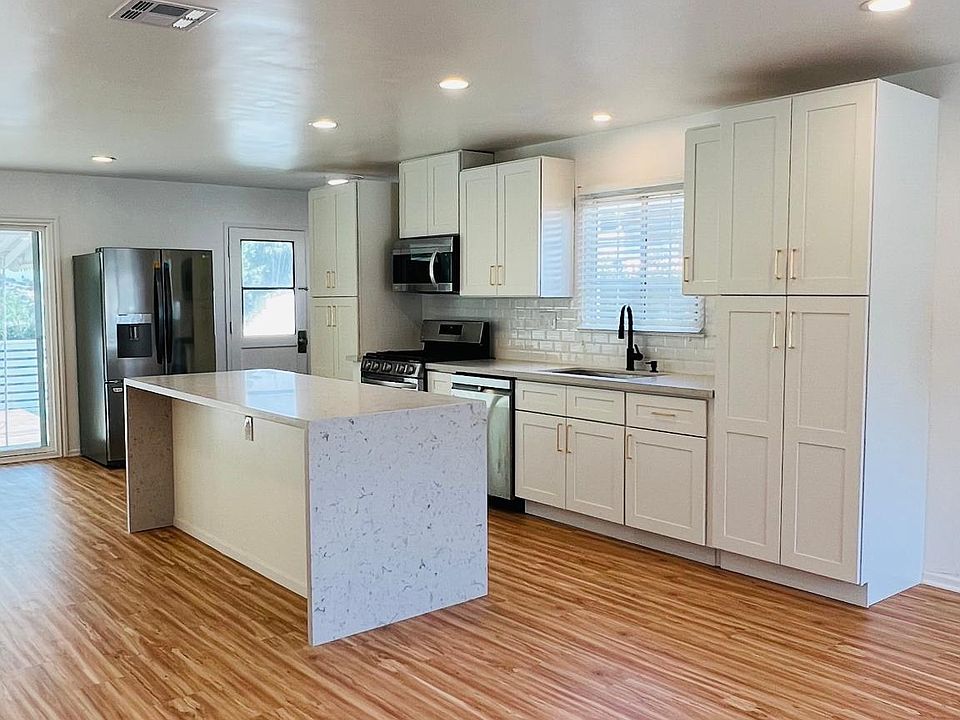 New kitchen, cabinets, stove, refrigerator