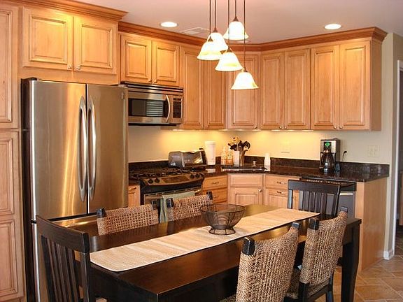 Kitchen Custom cabinets to ceiling upgrades galore
