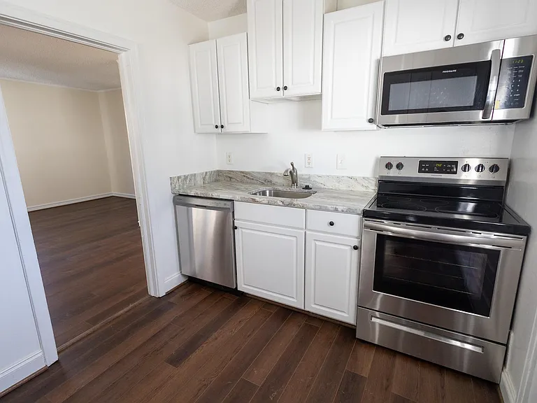 KItchen with granite and stainless appliances