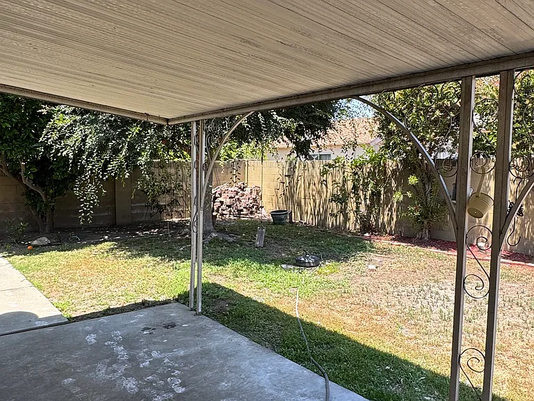Backyard with built-in shade for daily relaxation or party