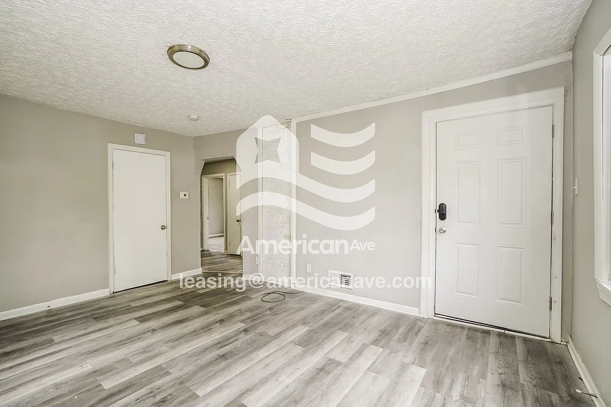 1187907_001_living_room_2.jpg - 982 E 14th Ave