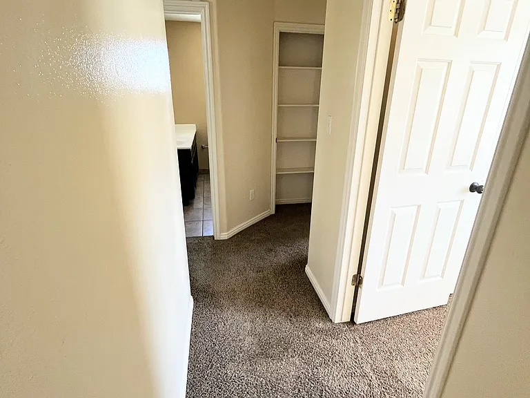 Level 4 hallway. 2 bedrooms on the right with the master on the left.