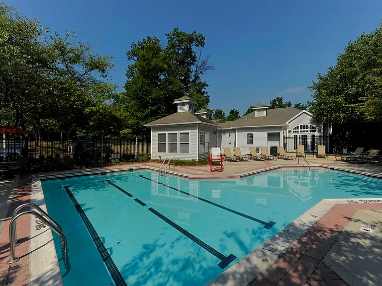 Swimming pool and sundeck with lounge seating