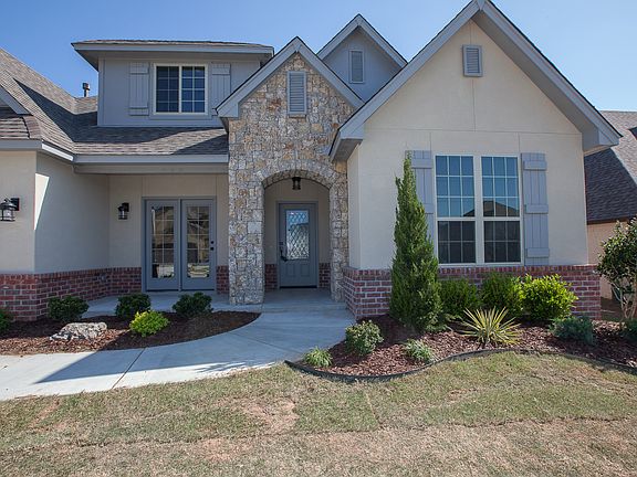 Inviting covered porch and sitting area