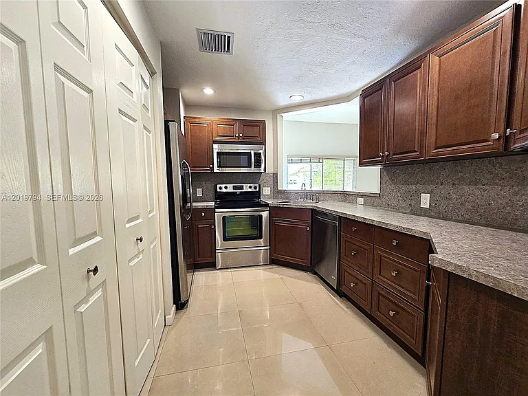 3457 NW 44th St #205 — Photo 15