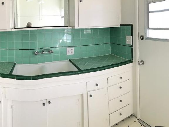 Kitchen with dining nook and back door