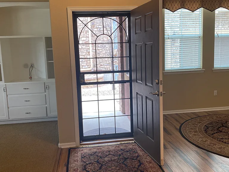Front door with security door. Glass and screens for the seasons.