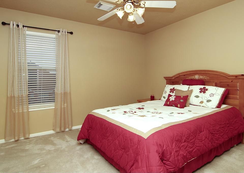 SECONDARY BEDROOM - Warm neutral colors gives this room a comfortable feeling, perfect to come crawl into bed and relax in.
