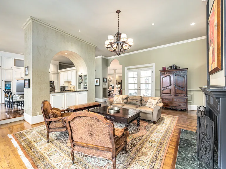 Family room with door to veranda and pool area