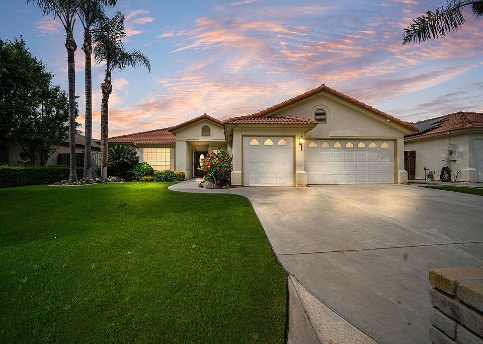 One of the most distinctive homes - a beautifully maintained Spanish Mediterranean residence where resort-style outdoor living meets, warm, spacious interiors. Enjoy the beautiful, expansive sunsets from the comfort of your home.
