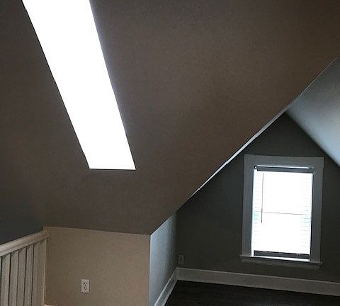 MORE of the LR--MORE Skylights--lots of sunlight--hear the rain