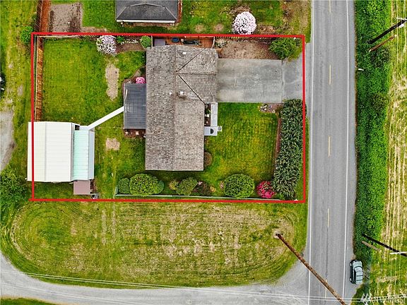 Great Sedro-Woolley rambler on nearly quarter acre with 660 sqft shop. Mature landscaping and plenty of garden space. 