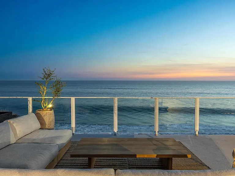 Immerse in alfresco luxury on the vast deck, offering both sunrise and sunset vistas.
