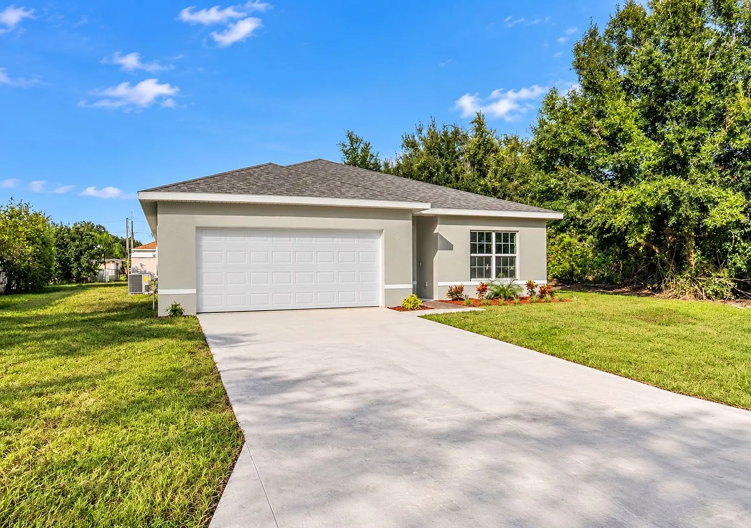Practically New & Packed with Upgrades A Must-See 4-Bedroom Gem in Poinciana! — Photo 1