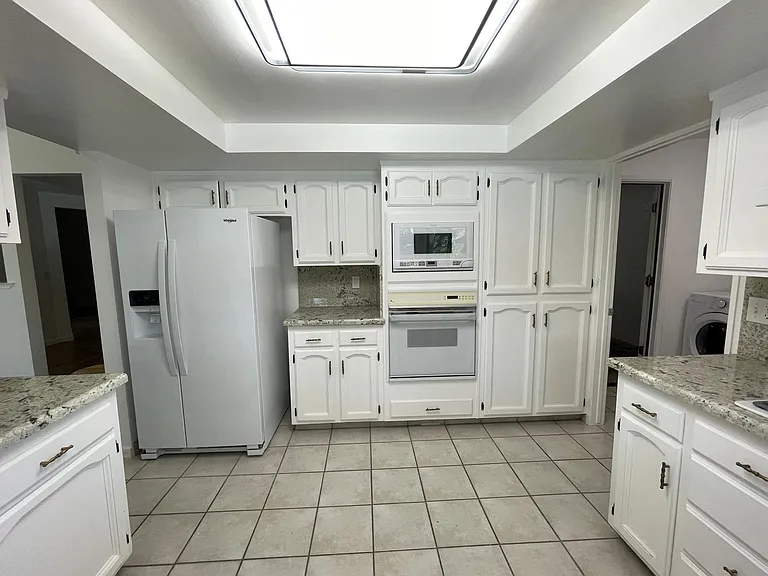 Lots of storage areas in the kitchen with switchable warm and cool light
