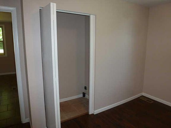 Laundry closet contains stack unit for tenant use