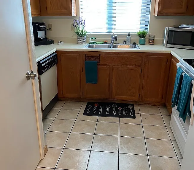 Kitchen with built in stackable washer/dryer