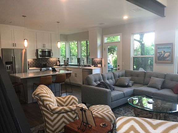 View from front door to living area and Kitchen